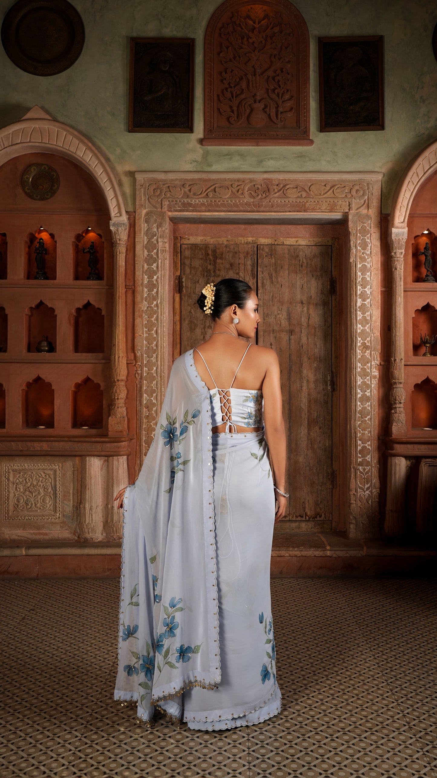 Abrasine powder blue hand painted sareee